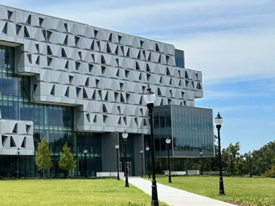 Image of the exterior elevation of Malachowsky Hall during the day time.