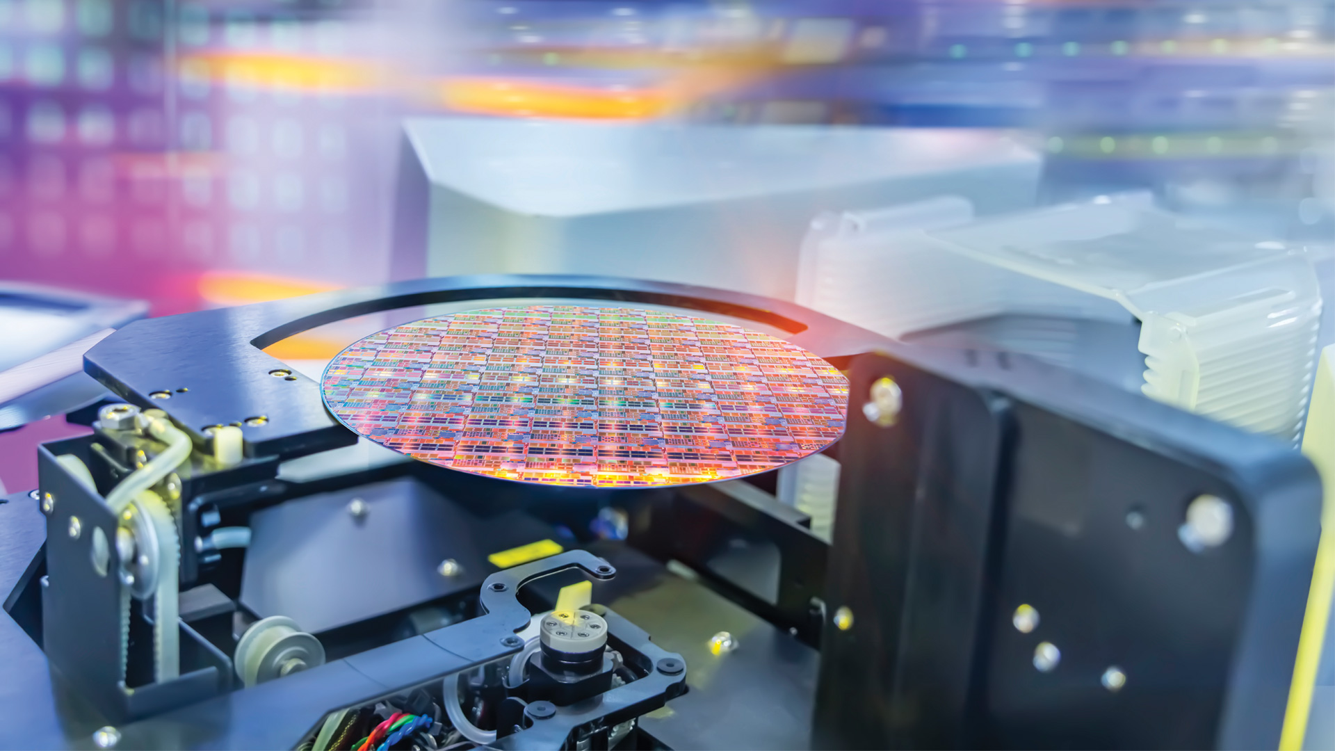 Semiconductor and Computer Chip Manufacturing at Fab or Foundry with robotic arms with silicon wafers